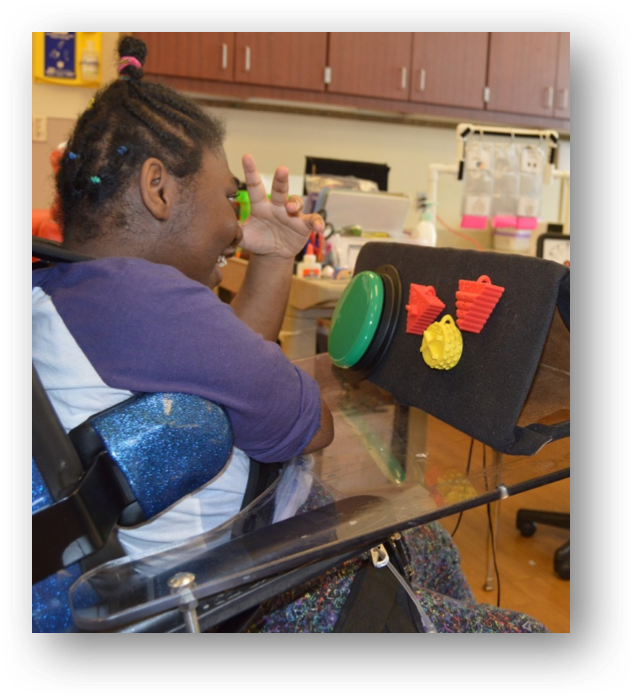 jade, using the 3d symbols mounted onto her wheelchair