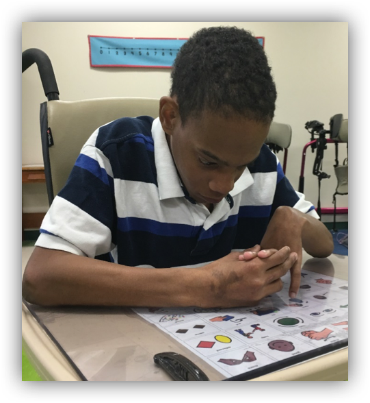 harold using core vocabulary communication board